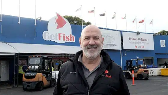 Fresho Software for fresh food wholesale suppliers and their customers - Photo of Get Fish's Manager standing outside in front of the Get Fish factory